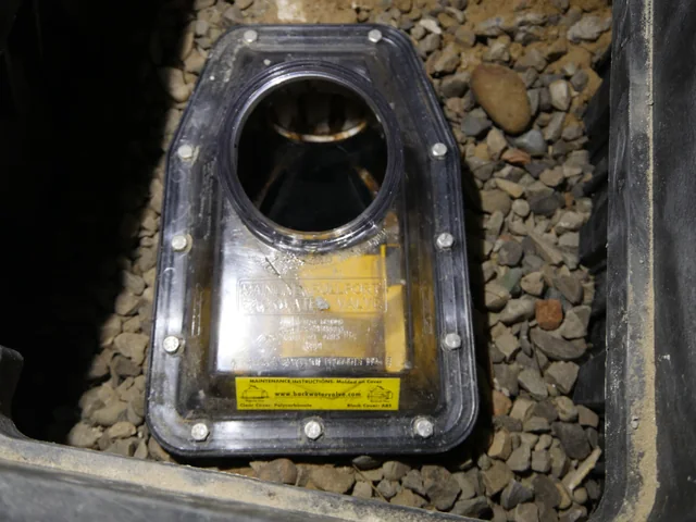 Interior backwater valve access cover and maintenance tools